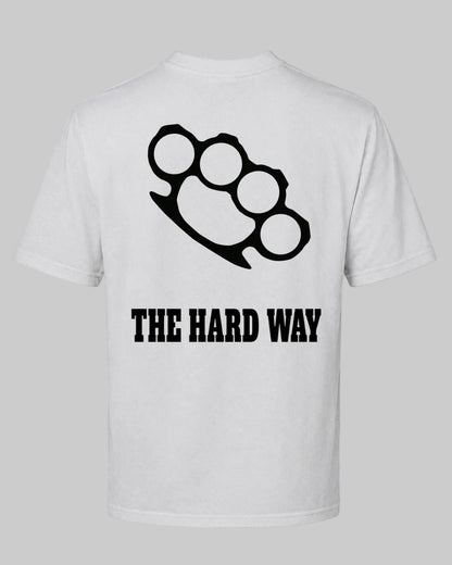 Titan Hard Way Oversized T-shirt in white by BD WEAR featuring a black brass knuckles graphic print and text The Hard Way on a grey background
